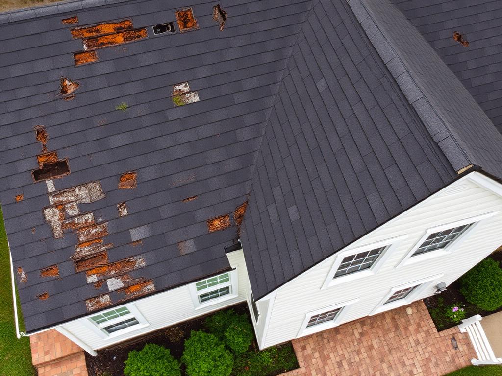 Storm-Damaged Colonial in Arlington, VA — before roof replacement